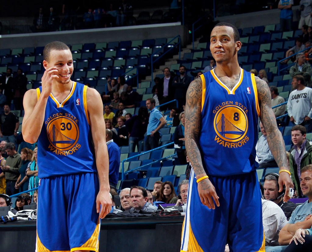 Stephen Curry and Monta Ellis in Golden State Warriors jerseys.