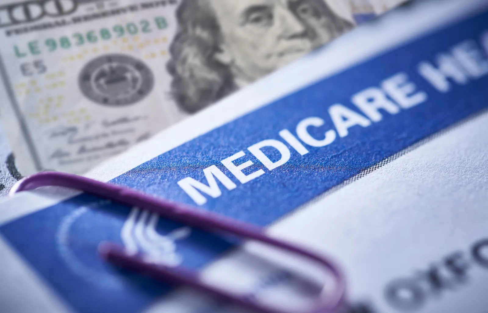 November 12, 2018: Medicare Health Insurance and Social Security card on medical report with stethoscope.