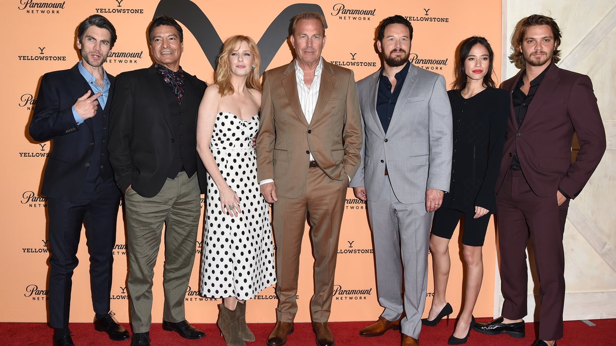 The cast of "Yellowstone" poses for a photo