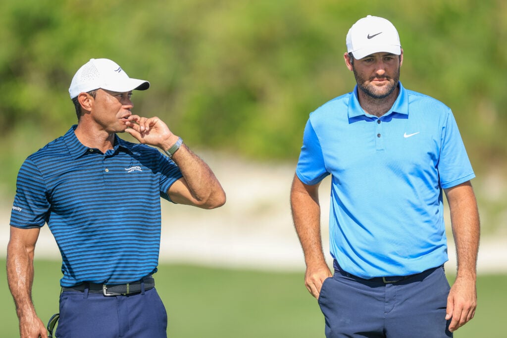 Tiger Woods of The United States out on the course watching Scottie Scheffler of The United States on the 16th hole during the pro-am prior to the Hero World Challenge 2025 at Albany Golf Course on December 03, 2025.