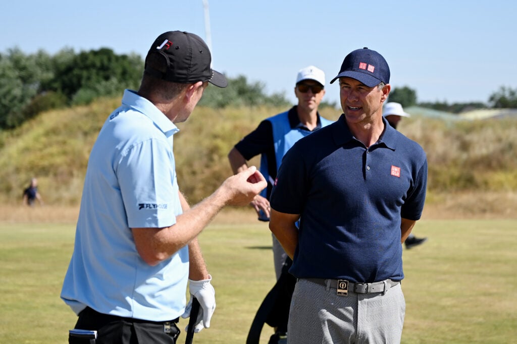 Adam Scott with Justin Rose during a practice round prior to The 154th Open Championship at Royal Birkdale