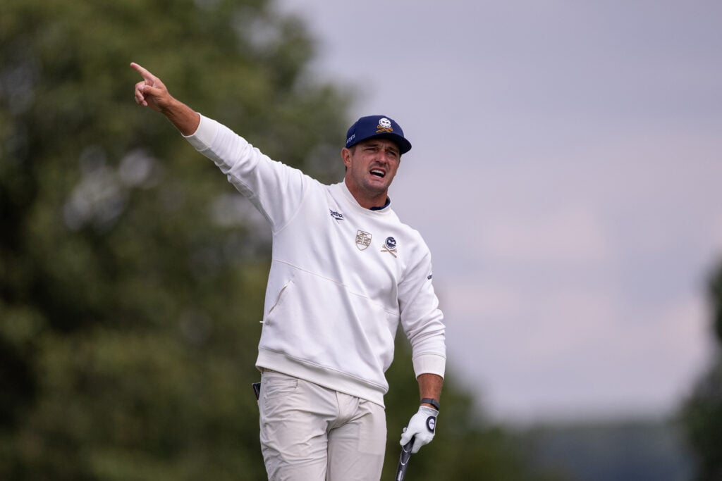 Bryson DeChambeau reacts to his approach during the final round of LIV Golf UK