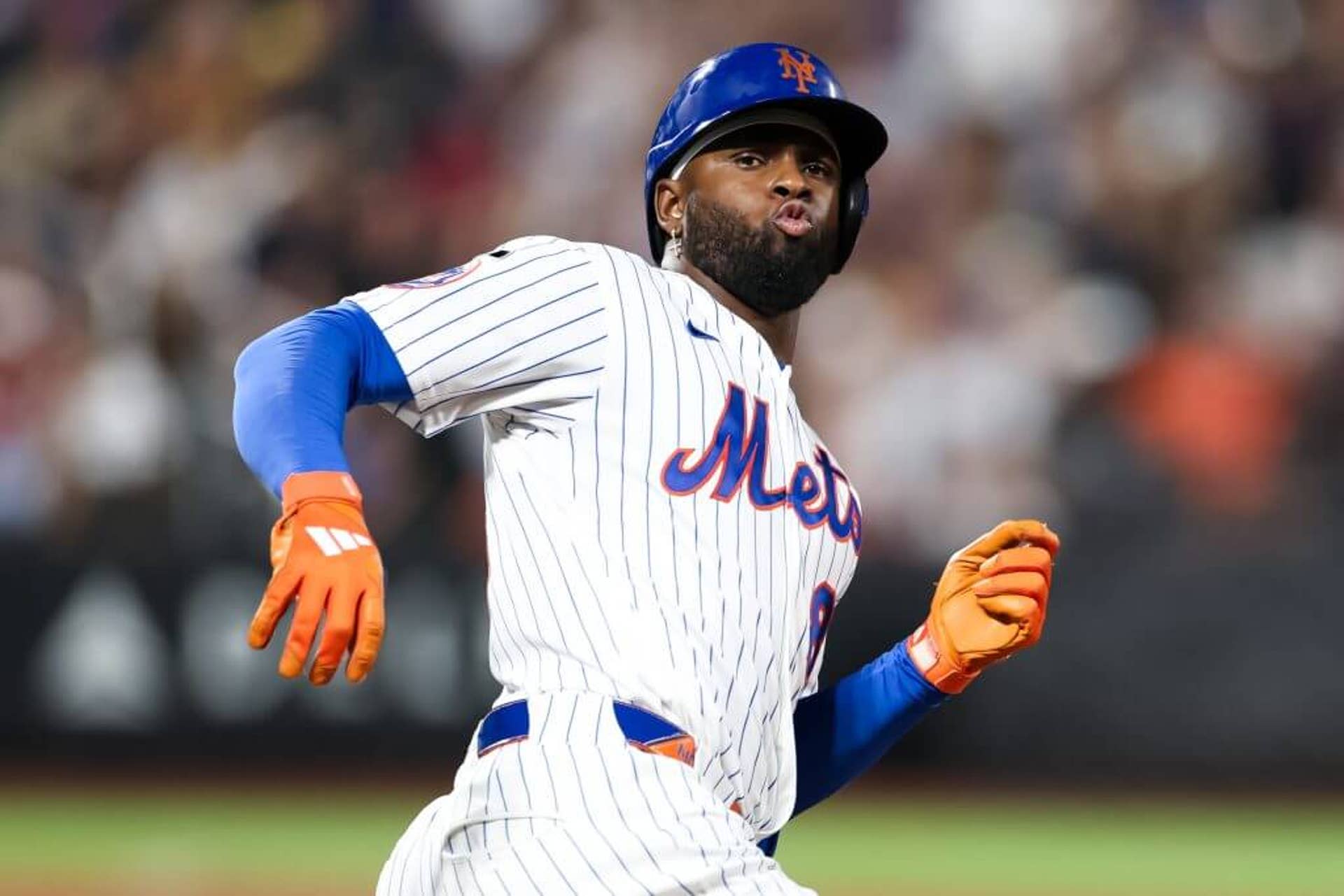 Luis Robert Jr. celebrates hitting a solo home run at Citi Field.