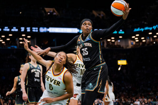 New York Liberty center Jonquel Jones (35) catches a rebound during the second half of a WNBA basketball game against the Indiana Fever, Saturday, Aug. 22, 2026, in New York. (AP Photo/Angelina Katsanis)