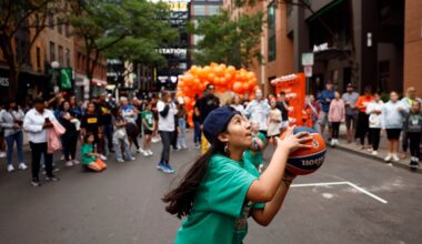 Kids play a game of knockout during the Sun block party on Canal Street in 2024.