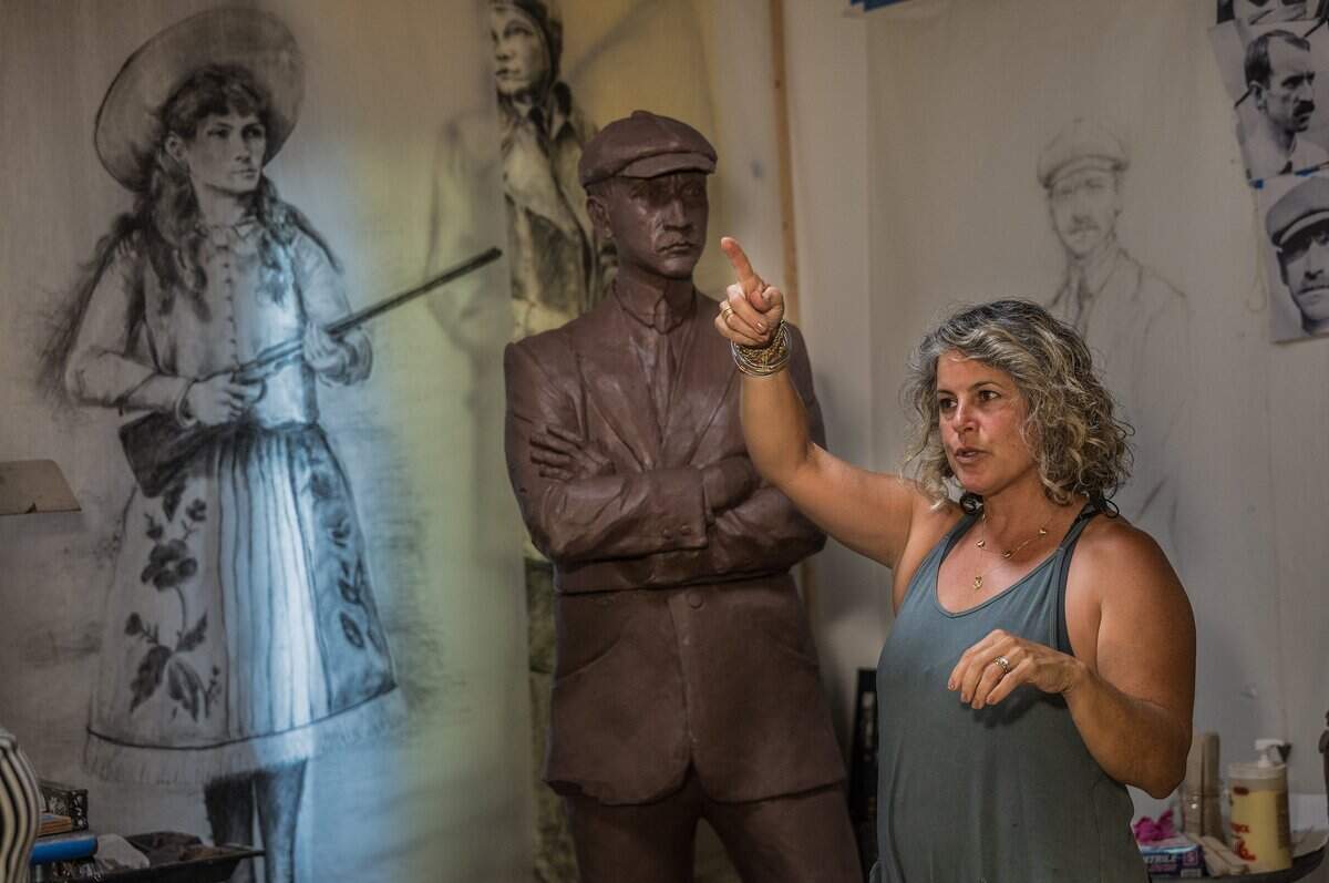 Cuban American sculptor Natalie Plasencia Calvo, who was born in Hialeah and raised in Miami Springs, talks about her Glenn Curtiss Statue, that will be on display at the site of the Centennial Legacy Project-the Glenn Curtiss & June Bug Legacy Memorial, to honor aviation pioneer and the City of Miami Springs founder Glenn Hammond Curtiss, in Miami Springs, on Friday July 24, 2026.