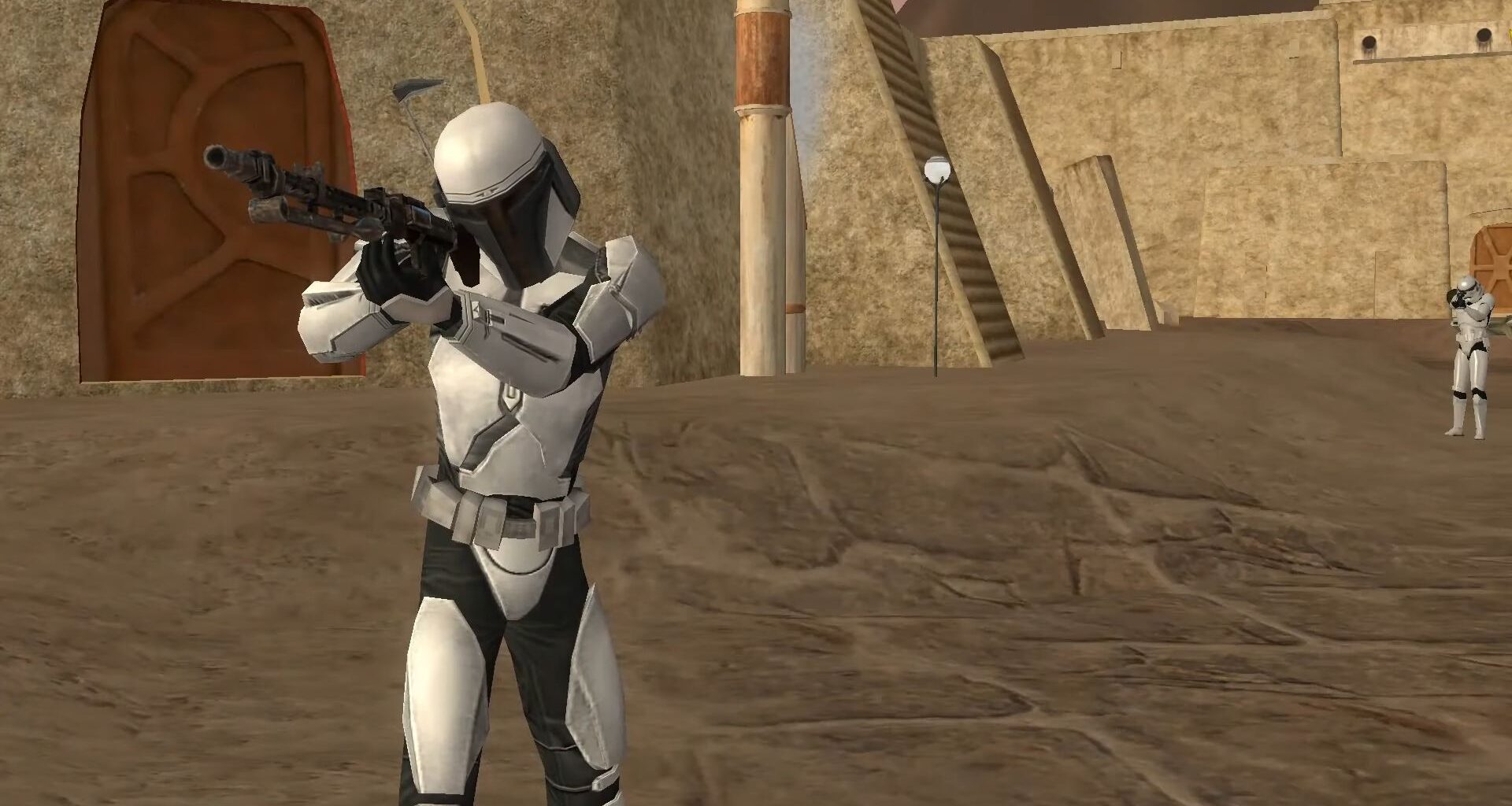 A Star Wars Galaxies character holds a gun.