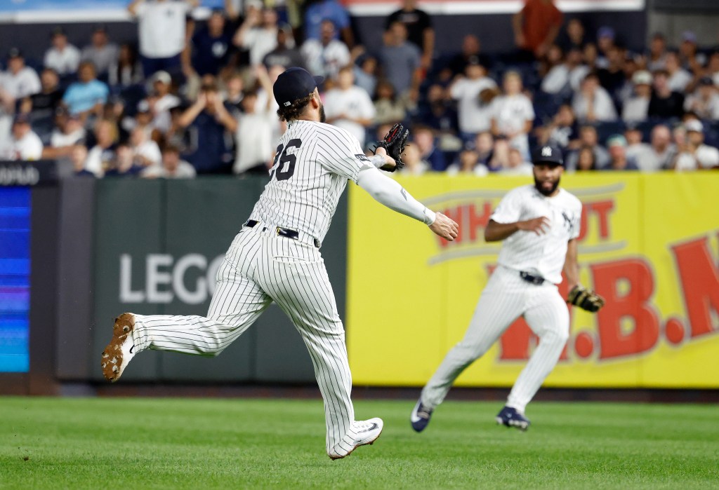 New York Yankees first baseman Luis García Jr. (26) makes a catch to end the 10th inning