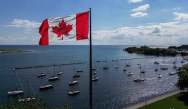 A Canadian flag flies along the waterfront of Lake Ontario, in Toronto, Ontario, Canada, on Aug 27.