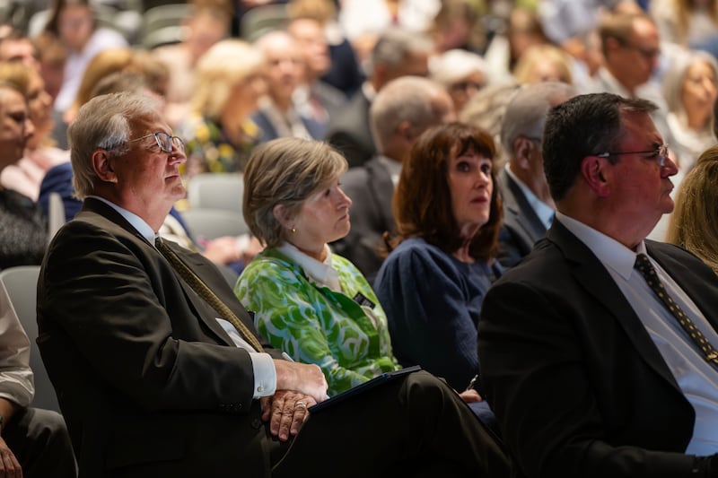 Senior missionaries listen as Sister Amy A. Wright, first counselor in the Primary general presidency, speaks during a devotional at the Provo MTC.