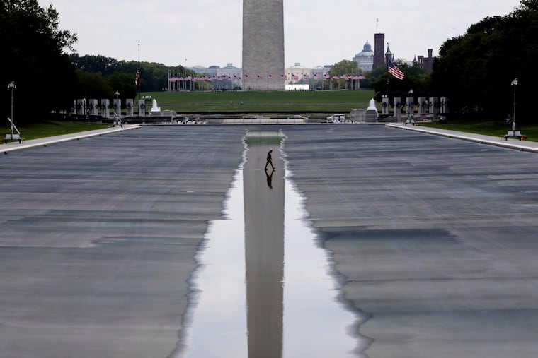 The Washington Monument is seen in the background of the now drained Lincoln Memorial Reflecting Pool last month.