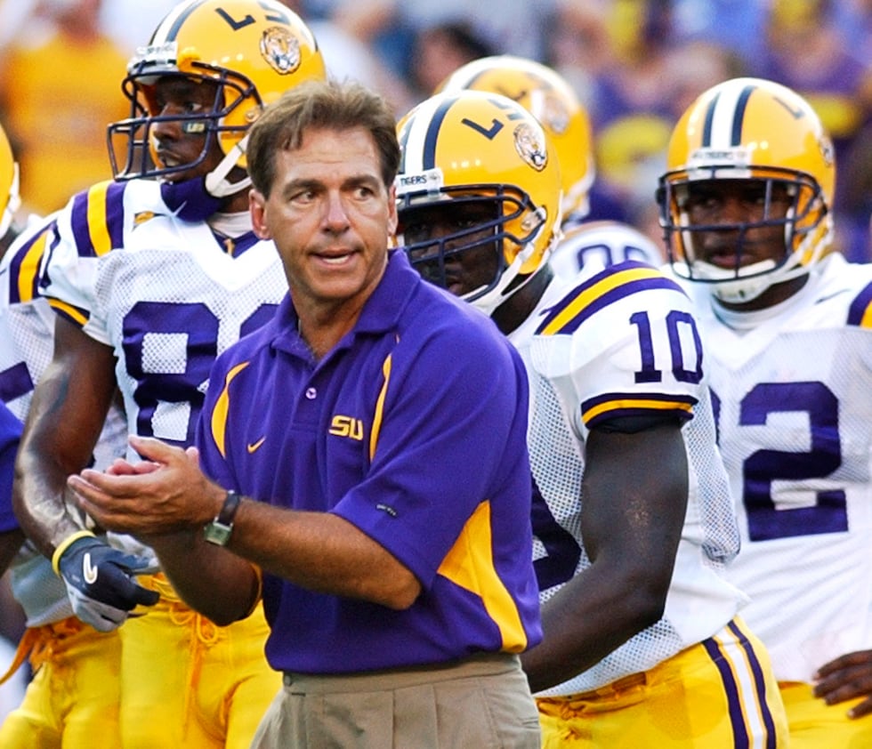FILE - In this Sept. 11, 2004, file photo, LSU coach Nick Saban encourages his players before...