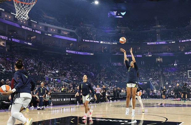 Dalls Wings guard Haley Jones gets her shots in during warmups before Monday's WNBA game against the Valkyries at Chase Center in San Francisco.. (Shmuel Thaler - Santa Cruz Sentinel)