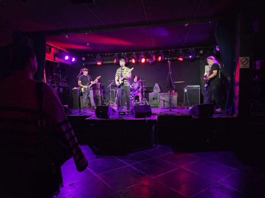 Band playing on stage.