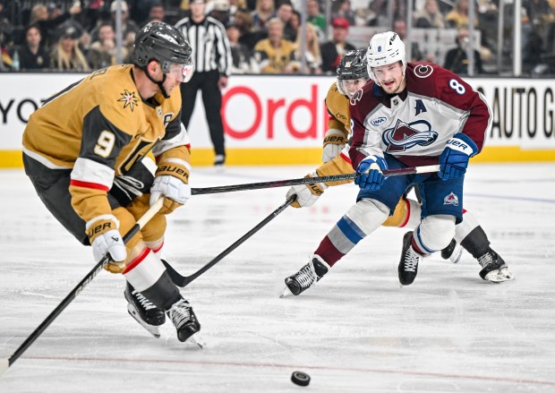 Cale Makar (8) of the Colorado Avalanche looks for space as Jack Eichel (9) and Pavel Dorofeyev (16) of the Vegas Golden Knights defend during the third period of the Golden Knights' 5-3 win in Game 3 of the NHL Western Conference Final at T-Mobile Arena in Las Vegas, Nevada on Sunday, May 24, 2026. (Photo by AAron Ontiveroz/The Denver Post)