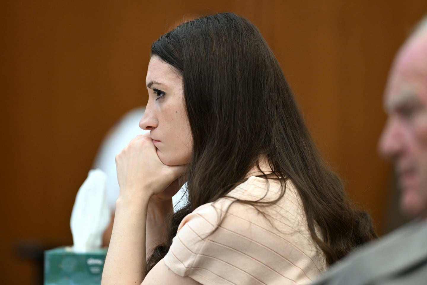 Lindsay Clancy, center, and her lawyer Kevin Reddington, right,  listen during testimony during Clancy's murder trial, Thursday, Aug. 13, 2026., in Plymouth, Mass.  