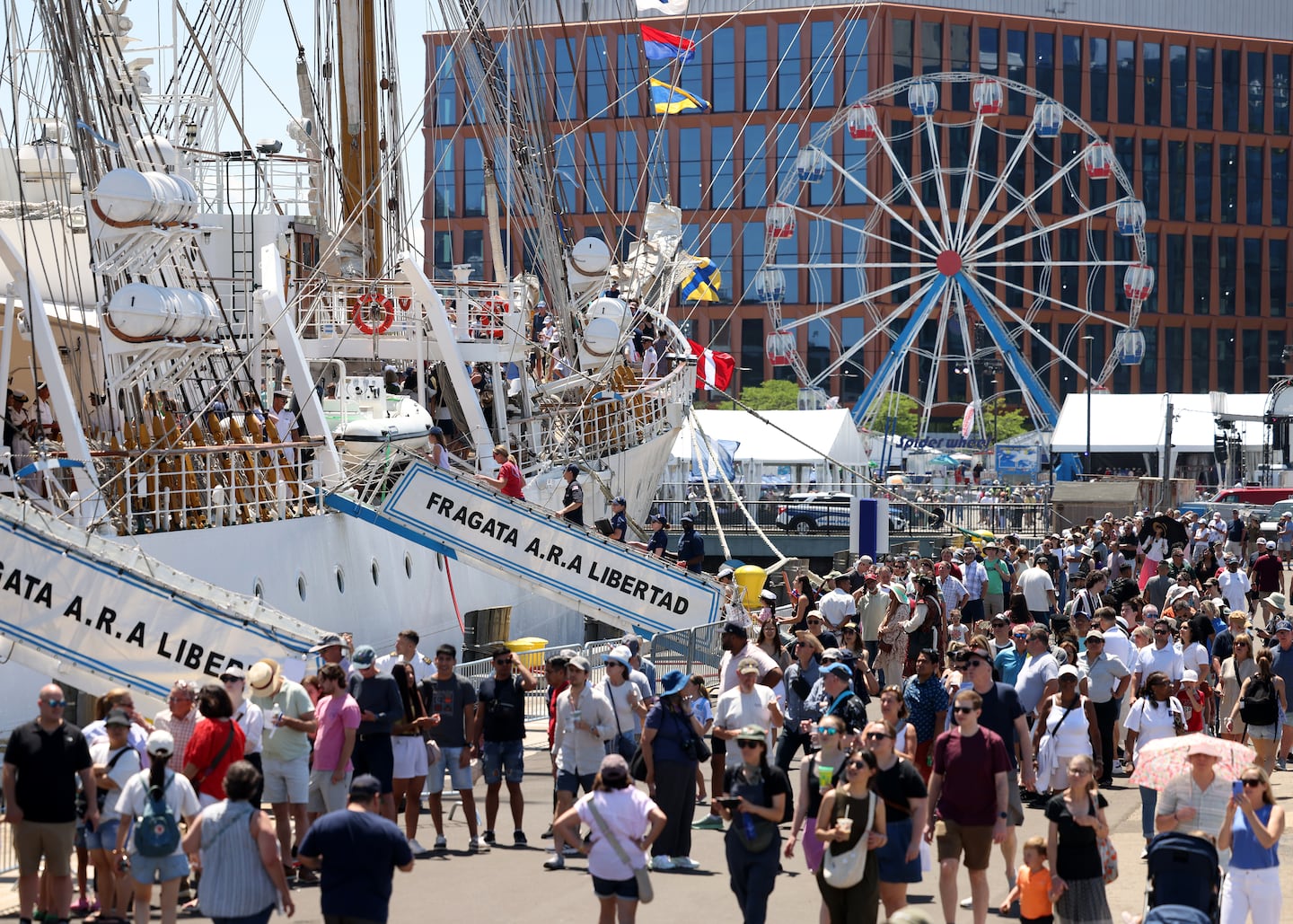 Crowds checked out the tall ships in Boston on July 12.
