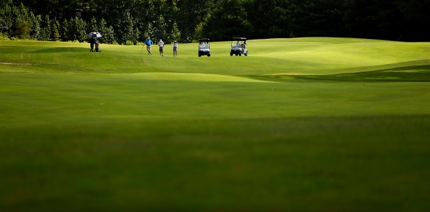 The greens at Virginia Beach National Golf Club look like the sand dunes of a dessert Thursday, August 6, 2026, morning. (Stephen M. Katz / The Virginian-Pilot)
