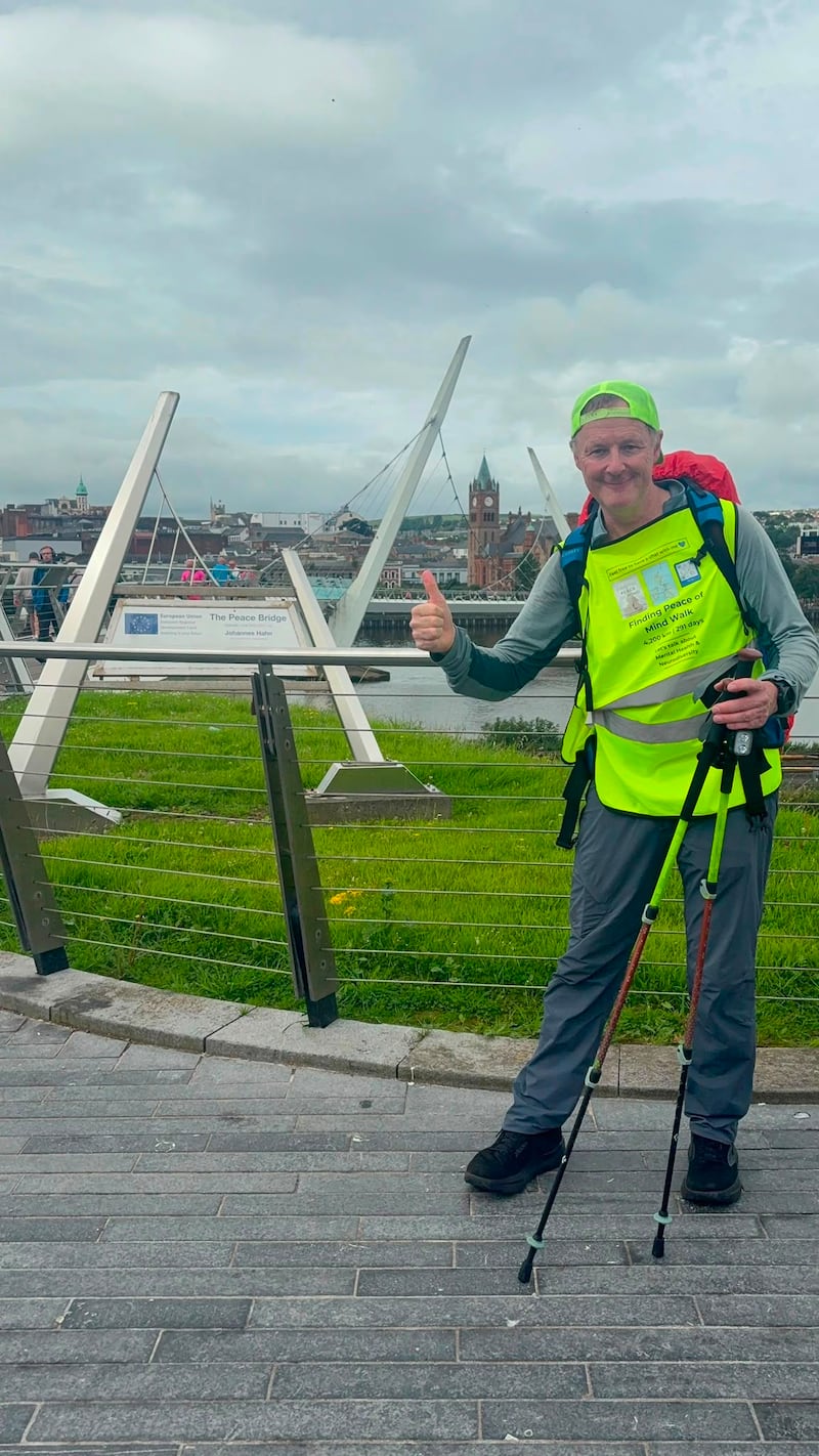 Jonathan crossing over the Peace Bridge in Derry on his walk to Dungiven