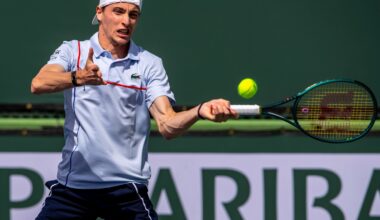 Ugo Humbert hits a forehand during a doubles match at Indian Wells.