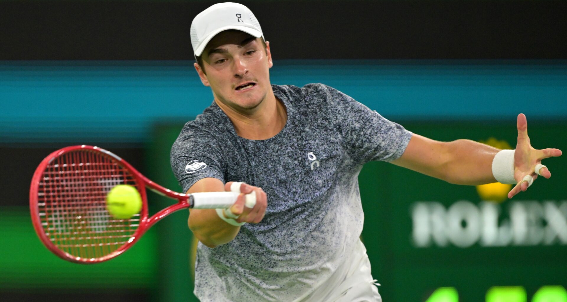 Joao Fonseca hits a forehand against Jannik Sinner at the 2026 BNP Paribas Open in Indian Wells.