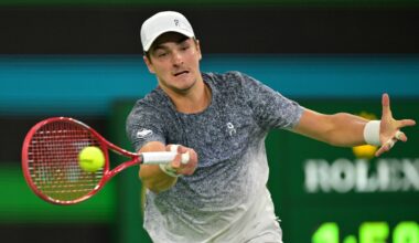 Joao Fonseca hits a forehand against Jannik Sinner at the 2026 BNP Paribas Open in Indian Wells.