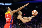 FILE — Portland Fire guard Carla Leite, right, drives past Phoenix Mercury forward Noemie Brochant (1) during the first half of a WNBA basketball game Sunday, Aug. 16, 2026, in Phoenix.