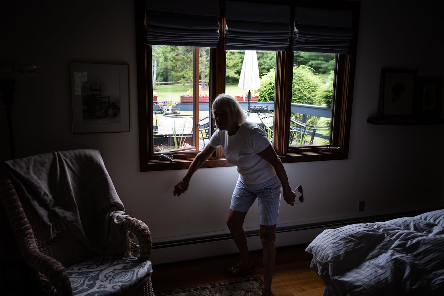 Suzanne Szermer indicated where a bear came through one of their windows earlier this summer in Stowe, Vt.