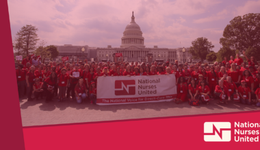 Nurses in front of capitol holding NNU banner.