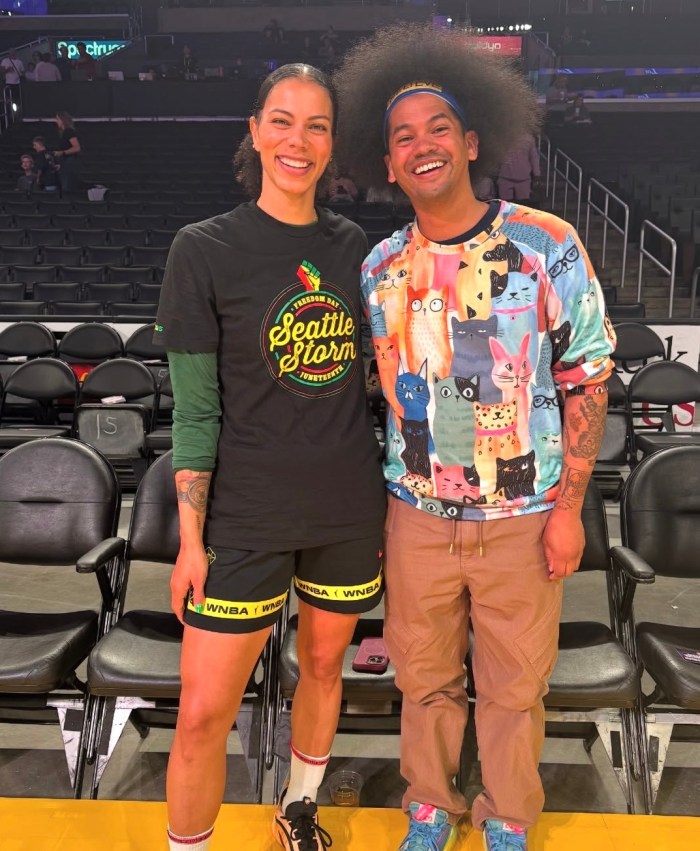 Then Seattle Storm player Alysha Clark (left) and librarian Mychal Threets in 2025.