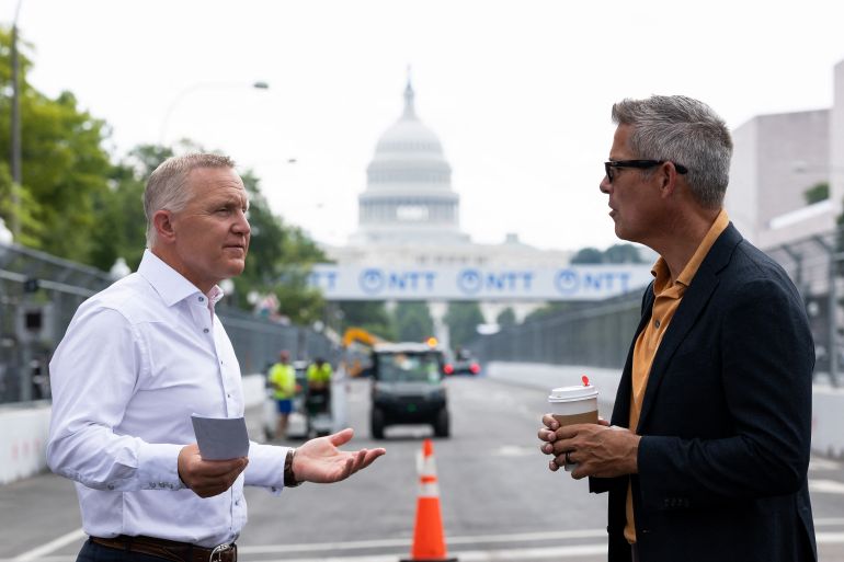 WASHINGTON, DC - AUGUST 20: CEO of Fox Sports Eric Shanks speaks with U.S. Secretary of Transportation Sean Duffy on the Freedom 250 Grand Prix track outside of the National Gallery of Art on August 20, 2026 in Washington, DC. Final preparations continue for the inaugural Freedom 250 Grand Prix, a two-day NTT IndyCar Series street race on August 22 and 23 past National Mall landmarks to celebrate America's 250th anniversary. Finn Gomez/Getty Images/AFP (Photo by Finn Gomez / GETTY IMAGES NORTH AMERICA / Getty Images via AFP)