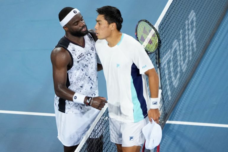 MASON, OHIO - AUGUST 22: Frances Tiafoe of the United States (L) and Brandon Nakashima of the United States meet at the net after Tiafoe won their match during day 12 of the Cincinnati Open at the Lindner Family Tennis Center on August 22, 2026 in Mason, Ohio. Dylan Buell/Getty Images/AFP (Photo by Dylan Buell / GETTY IMAGES NORTH AMERICA / Getty Images via AFP)