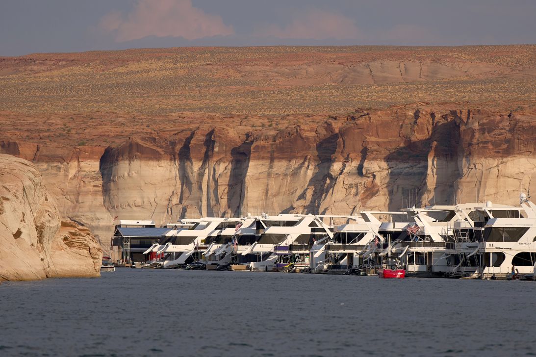 Houseboats are moored at the Antelope Point Marina on Lake Powell at the Glen Canyon National Recreation Area, on July 15.