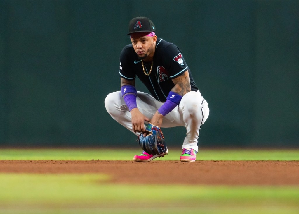 Arizona Diamondbacks second baseman Ketel Marte crouching on the field.