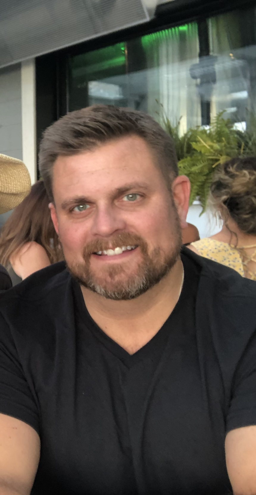 Brian Thompson is seen in a family photo.