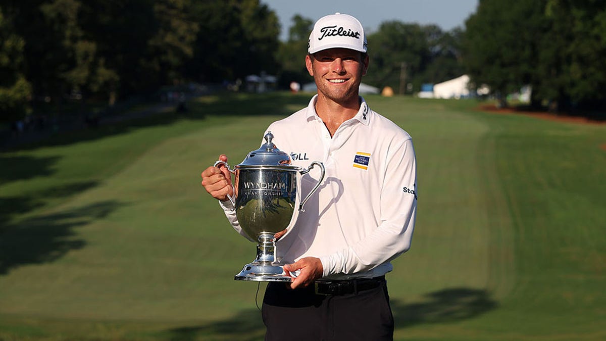 Michael Brennan with trophy