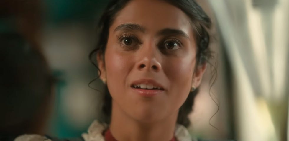 Lovesick trailer woman looking surprised with a soft focus background.