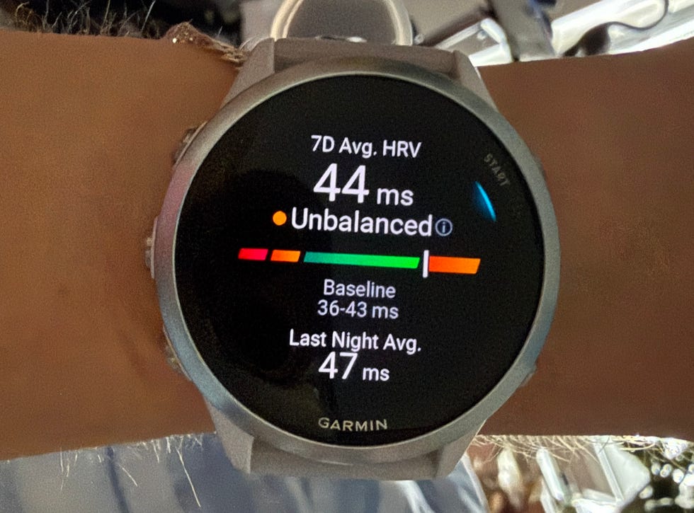 Garmin smartwatch displaying heart rate variability metrics, showing 7-day average as 44 ms and status as unbalanced. Garmin smartwatch displaying heart rate variability metrics, showing 7-day average as 44 ms and status as unbalanced.