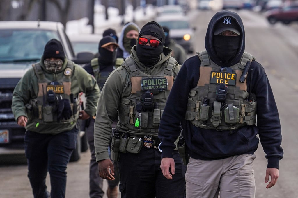 Federal agents conducting immigration enforcement operations in Minneapolis in February. Photo: AP