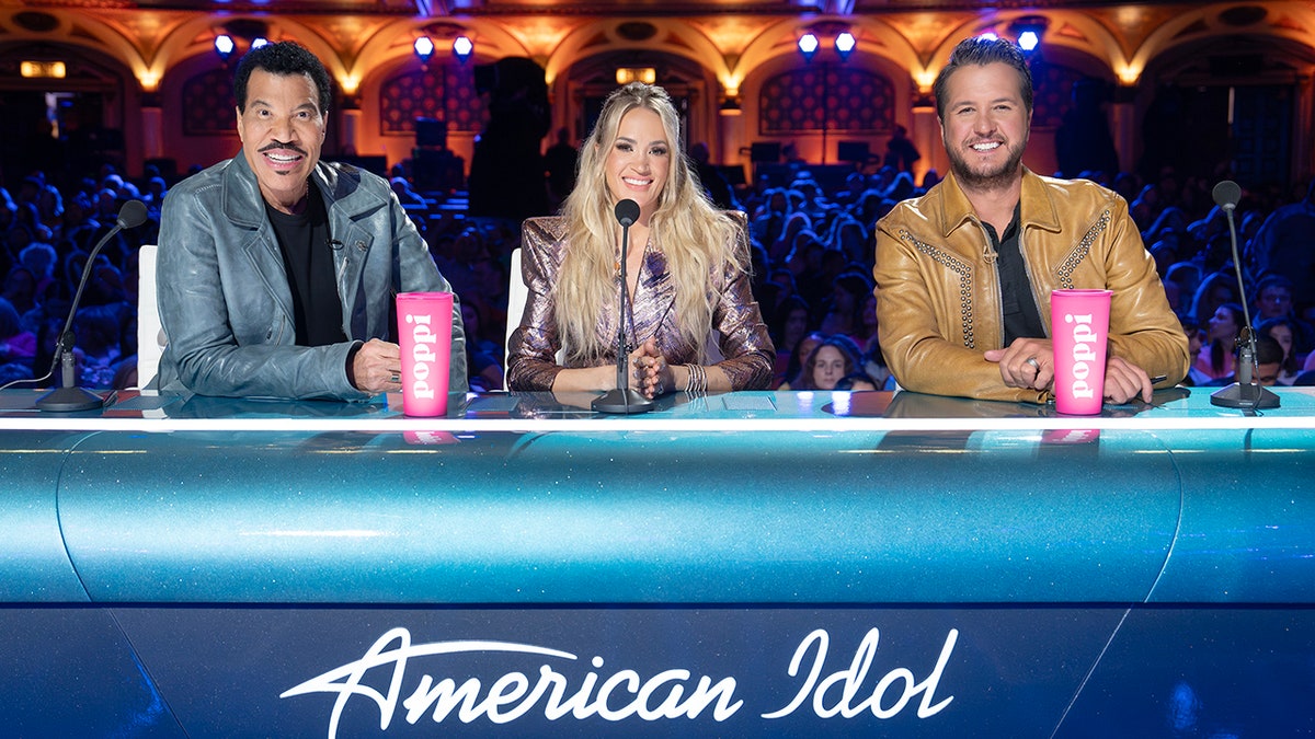 Lionel Richie, Carrie Underwood and Luke Bryan at the American Idol judging table.