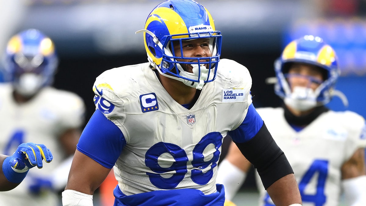 Sep 26, 2021; Inglewood, California, USA; Los Angeles Rams defensive end Aaron Donald (99) celebrates after a play in the second half of the game against the Tampa Bay Buccaneers at SoFi Stadium.