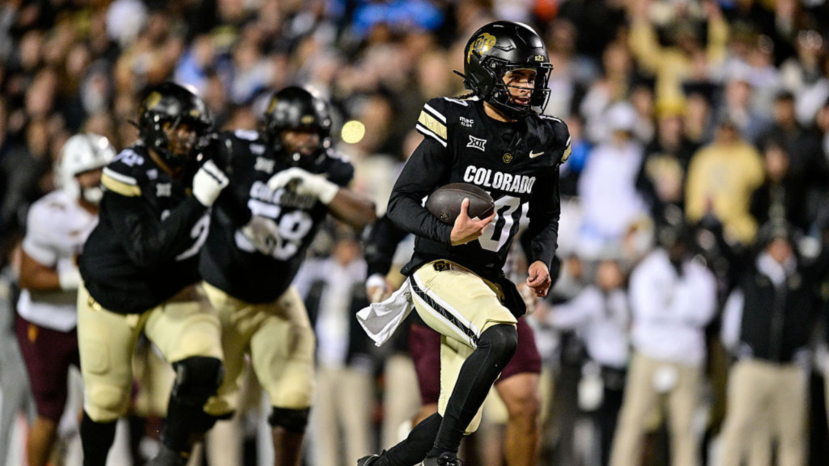 BOULDER, CO - NOVEMBER 22: Julian Lewis #10 of the Colorado Buffaloes carries the ball for a gain in the first half against the Arizona State Sun Devils at Folsom Field on November 22, 2025 in Boulder, Colorado. (Photo by Dustin Bradford/Getty Images)