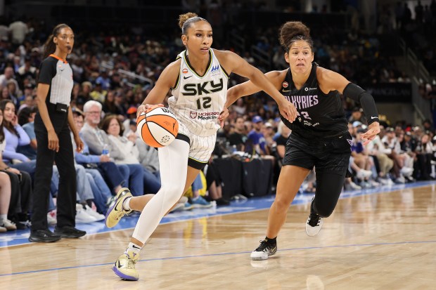 Sydney Taylor of the Chicago Sky drives to the basket against Veronica Burton of the Golden State Valkyries during the second half at Wintrust Arena on Aug. 21, 2026, in Chicago. (Michael Reaves/Getty Images)