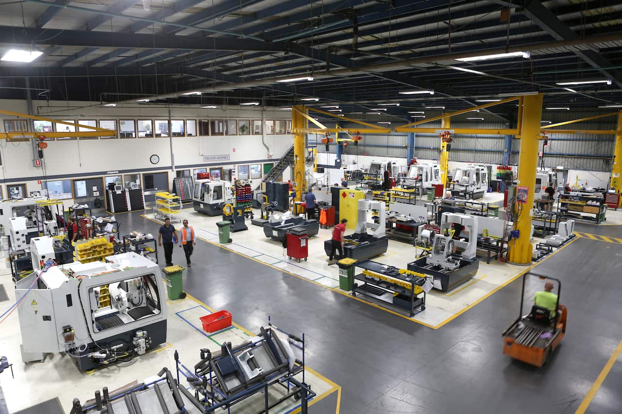 An aerial shot of a factory floor where computer numerical controlled machines are being built.