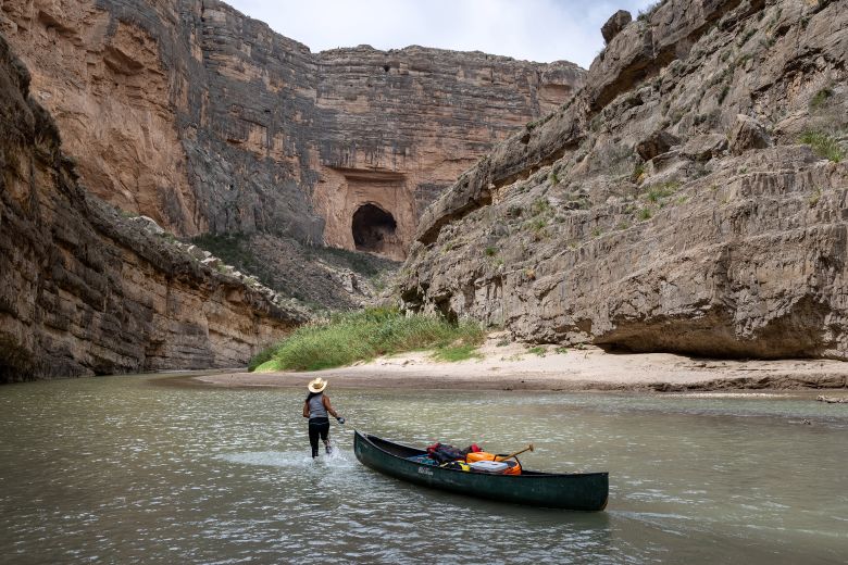 A river guide pulls a canoe through the Santa Elena Canyon in April 2026. Tourism is an important business for the area.