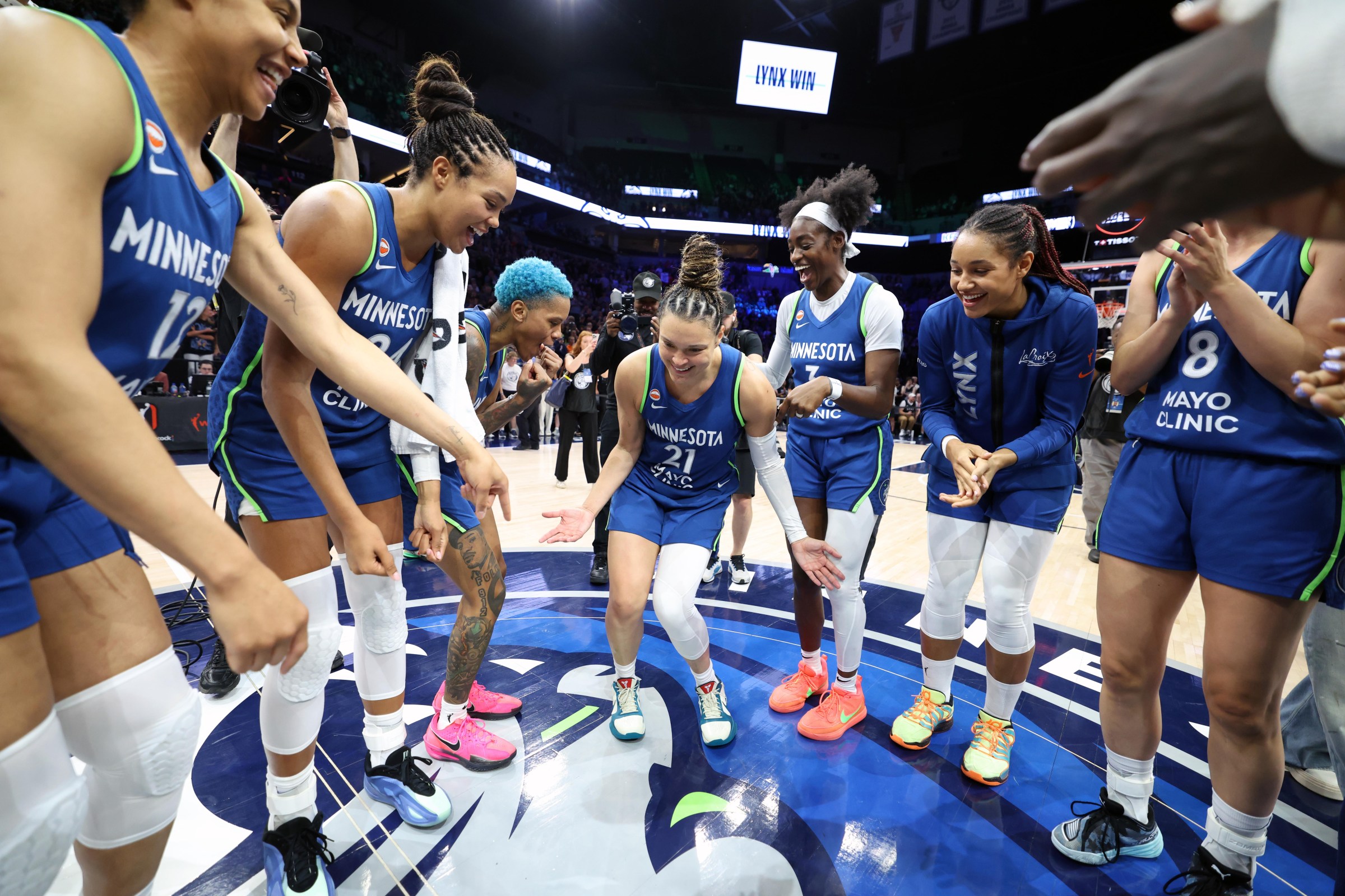 MINNEAPOLIS, MN - AUGUST 9: Kayla McBride #21 of the Minnesota Lynx celebrates with her teammates after scoring ten three point basket to break the WNBA Record for most three pointers made in a game on August 9, 2026 at Target Center in Minneapolis, Minnesota. NOTE TO USER: User expressly acknowledges and agrees that, by downloading and or using this Photograph, user is consenting to the terms and conditions of the Getty Images License Agreement. Mandatory Copyright Notice: Copyright 2026 NBAE (Photo by David Sherman/NBAE via Getty Images)