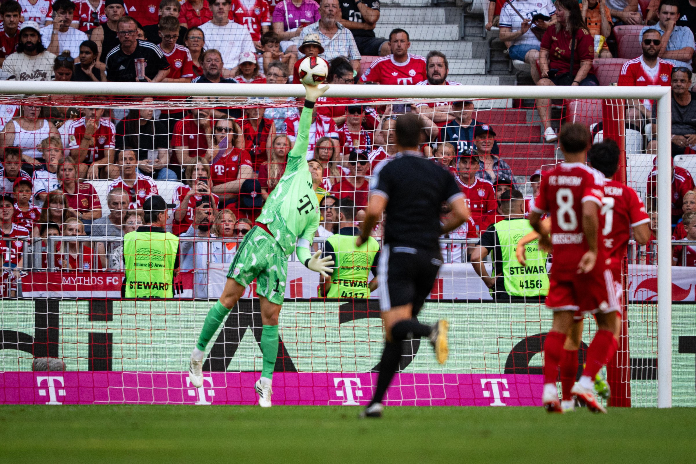 MUNICH, GERMANY - AUGUST 15: Manuel Neuer of FC Bayern Muenchen jumps for the ball during the Telekom Cup match between FC Bayern München and RB Leipzig at Allianz Arena on August 15, 2026 in Munich, Germany. (Photo by F. Noever/FC Bayern via Getty Images)