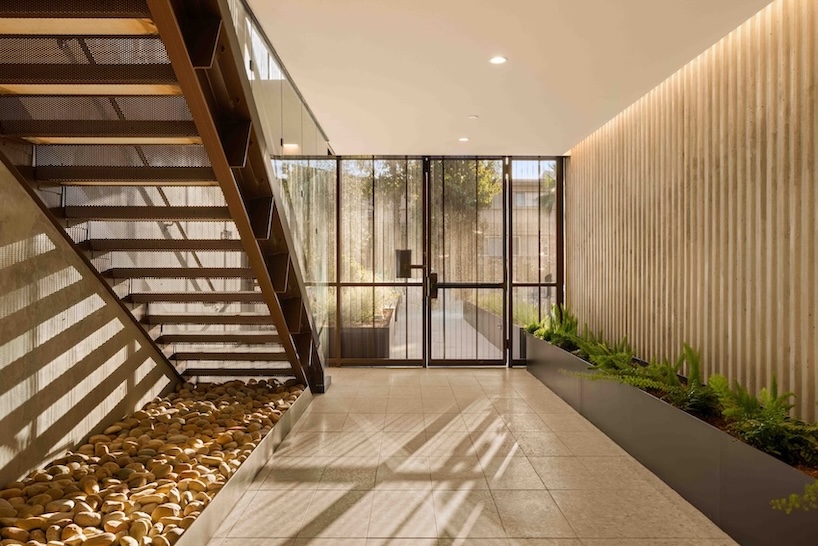 bronze corrugated metal wraps spf:architects' multifamily housing in west hollywood - 7