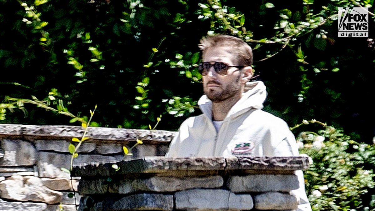 Brian Hickerson walks outside