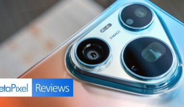 A close-up view of a smartphone camera module with three lenses and the text "XMAGE" printed on the metallic housing, with a "PetaPixel Reviews" logo in the bottom left corner.